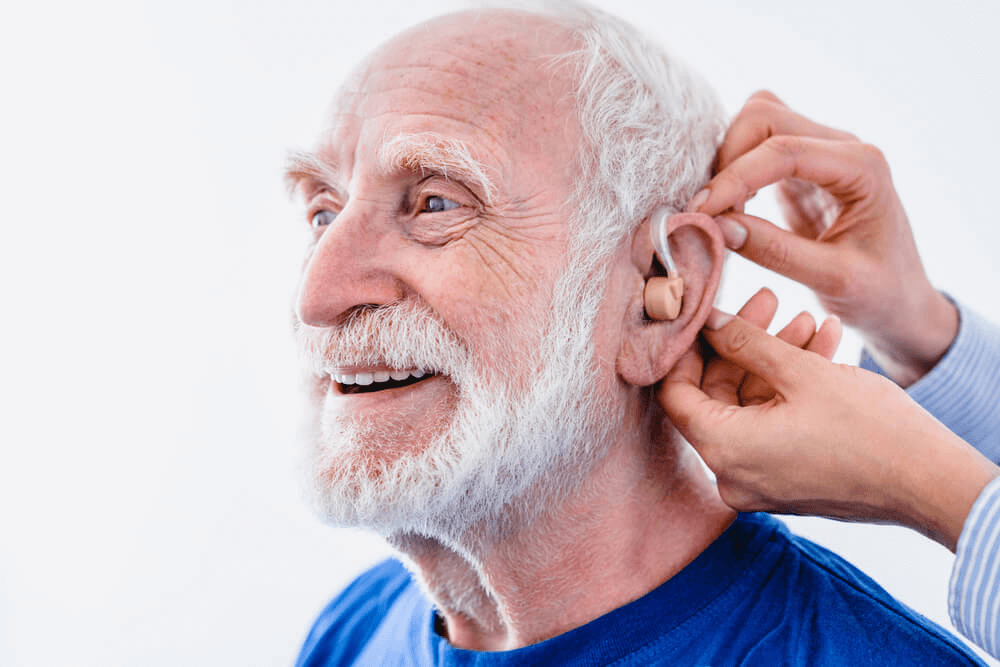 old guy with hearing aids